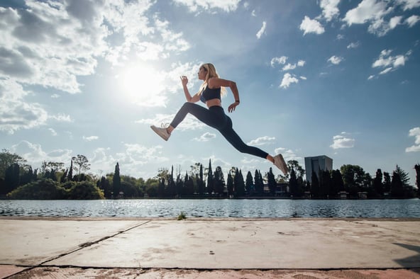 woman jumping forward